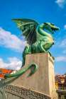 Slovenia, Ljubljana. Statue on Dragon Bridge. Art Print